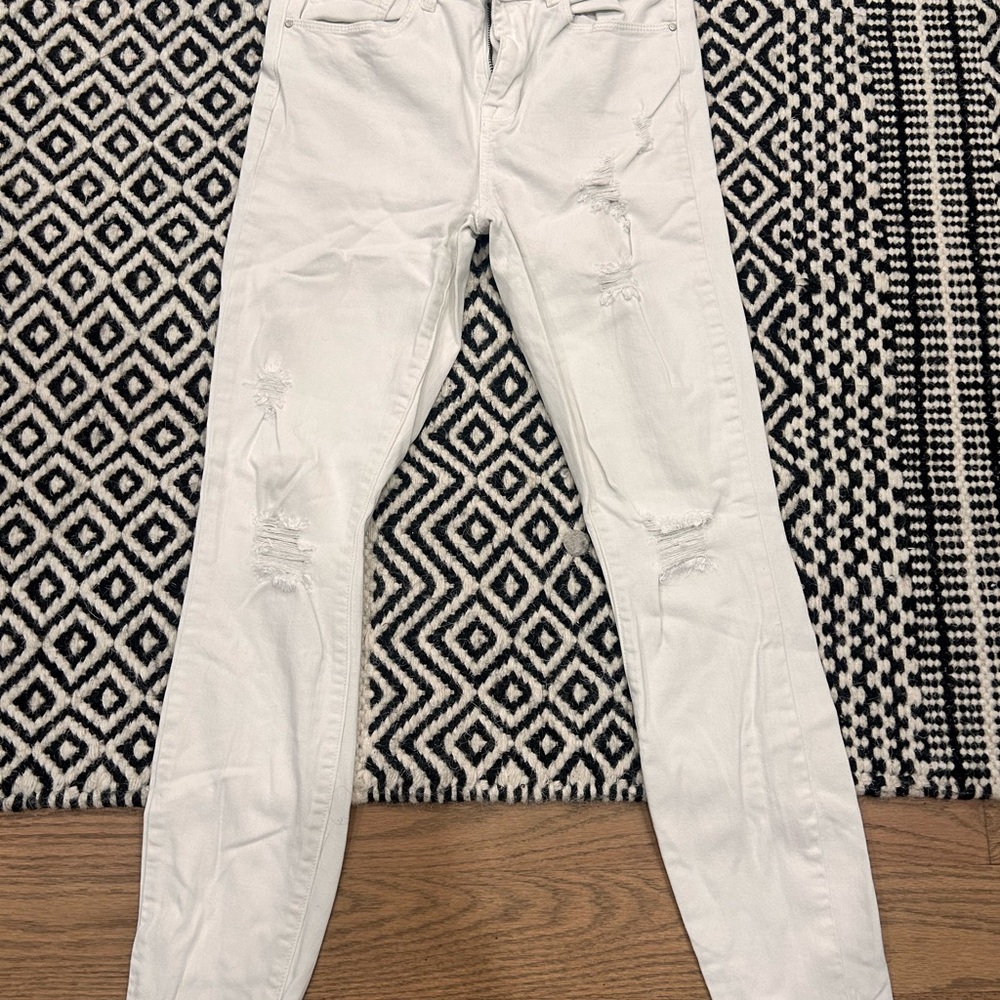 Women's Distressed White Jeans